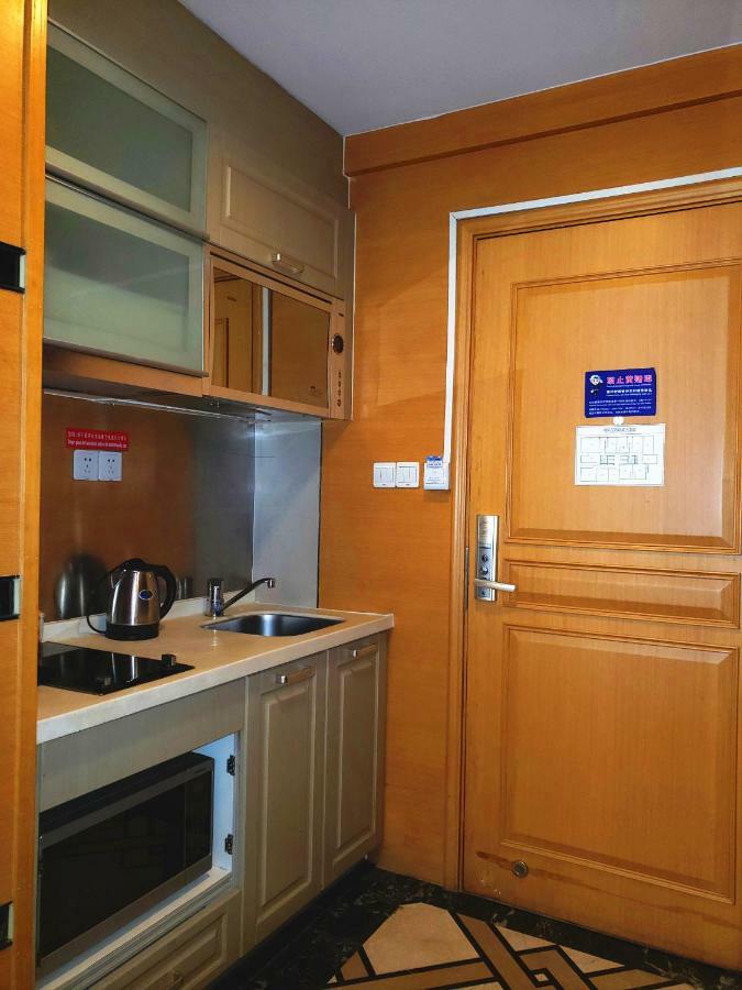 She & He Service Apartment Huifeng Гуанчжоу Экстерьер фото
