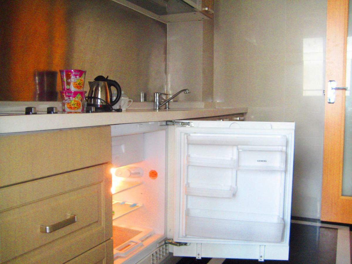 She & He Service Apartment Huifeng Гуанчжоу Экстерьер фото